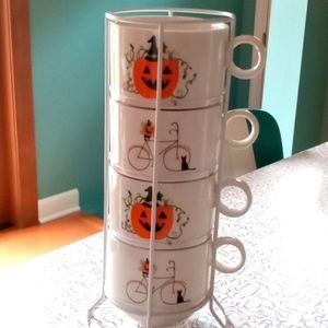 Halloween Mugs stacked in holder.🐈‍⬛🐈‍⬛🐈‍⬛🎃🎃🎃🎃